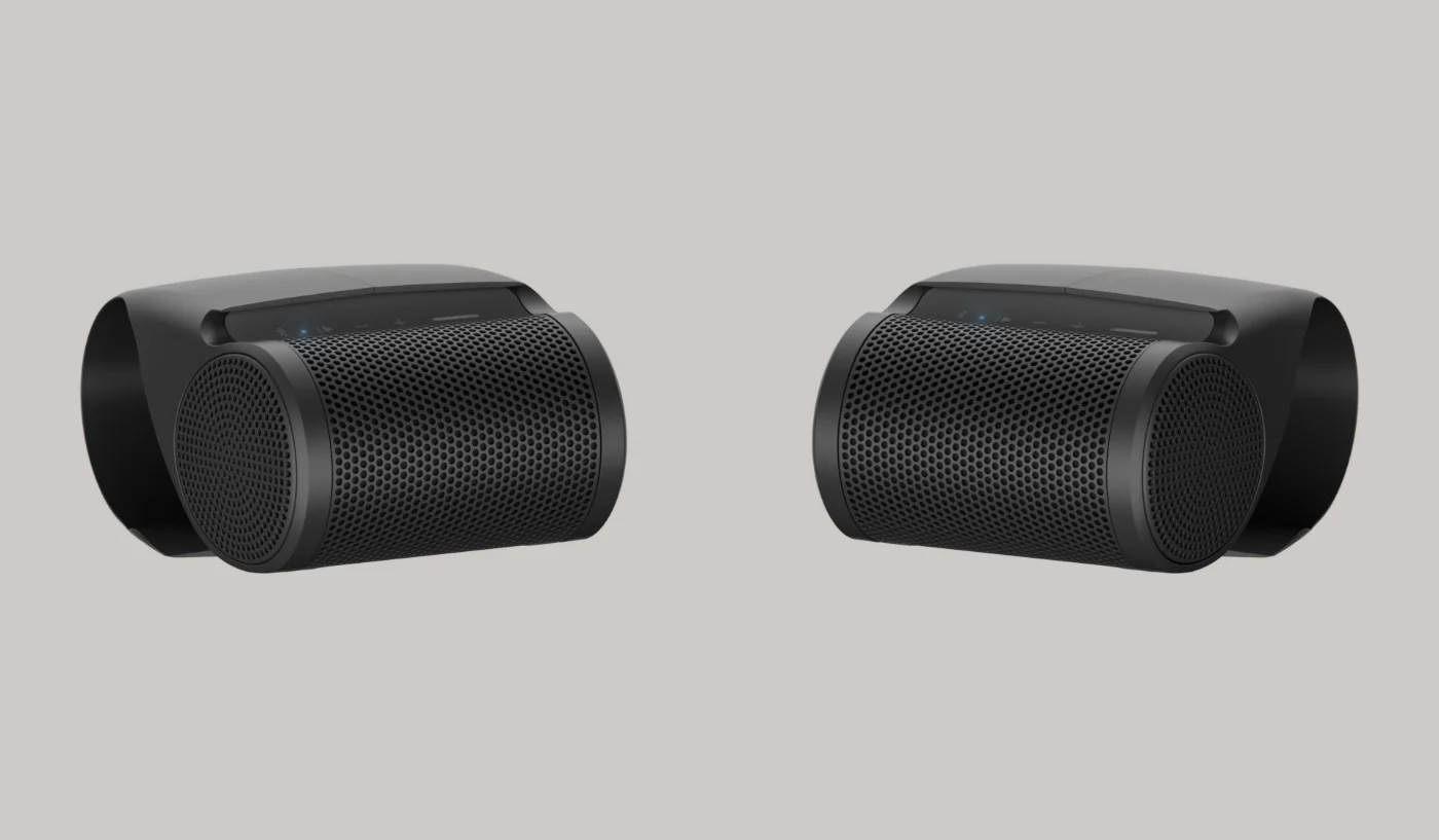The two CoAudio OneTwo speakers placed apart as a stereo pair